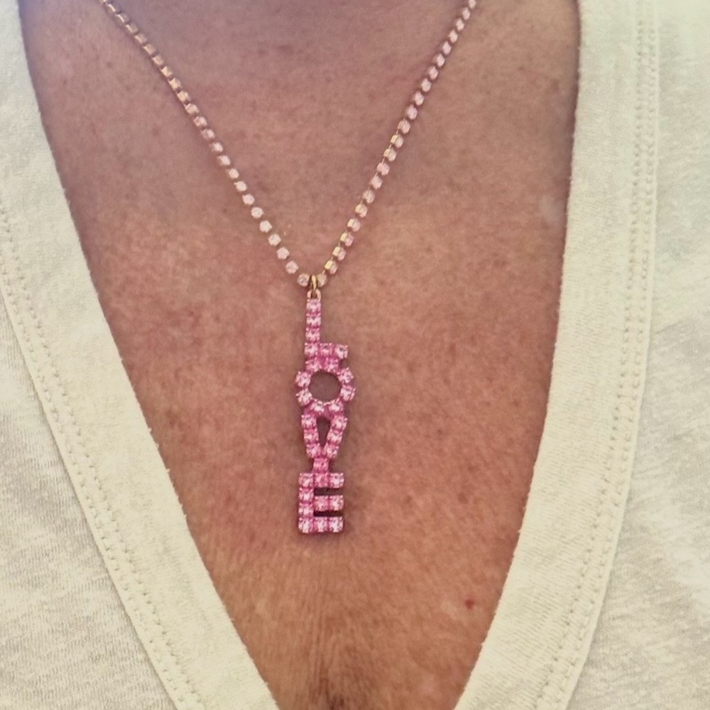 L❤️VE that sparkles. Our crystal love necklace that says it all.